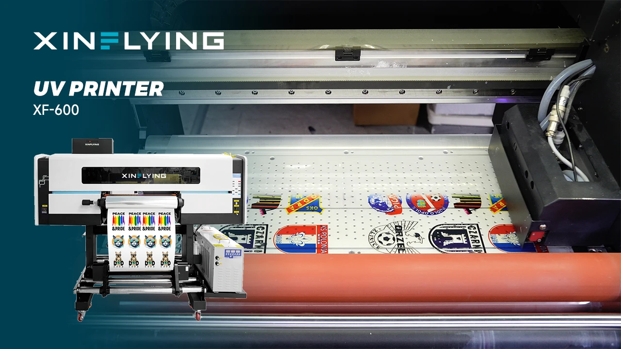 UV DTF printer producing film transfers in a commercial print workshop